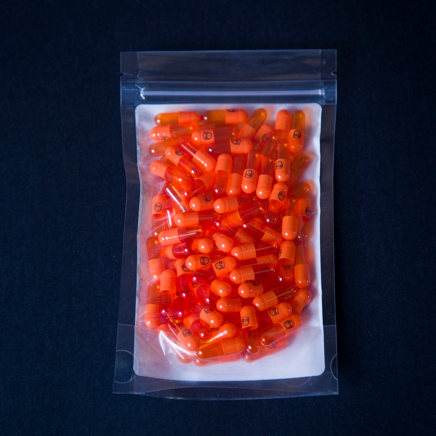 Orange Trump heads, empty gelatin capsules - size 0