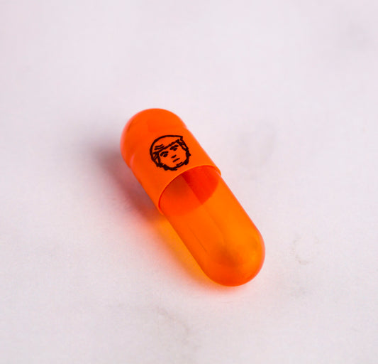 Orange Trump heads, empty gelatin capsules - size 0